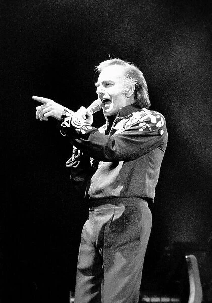 Singer Neil Diamond who had a hit with Sweet Caroline. He is pictured here live in