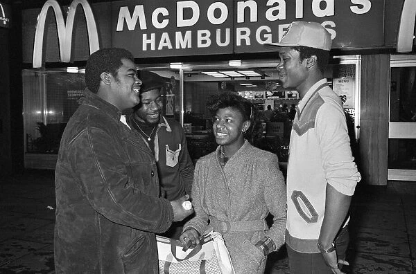 Young people standing outside McDonalds. 3rd April 1980