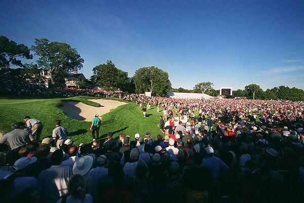 Crowds Storm The 18th Hole