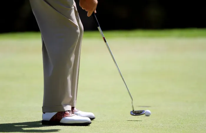 Framed Print : Golfer Putting On Green Framed Print : Golfer Putting On Green