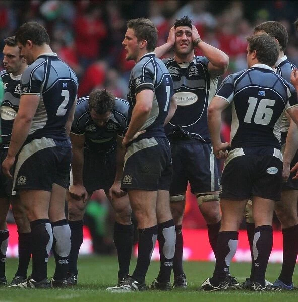 Kelly Brown & Dejected Scotland Players