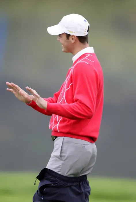 Framed Print : Martin Kaymer Cools The Fans Whistles As He Removes Over Tro Framed Print : Martin Kaymer Cools The Fans Whistles As He Removes Over Tro