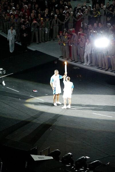 Nikos Kaklamanakis Receives The Torch From Ioannis Melissand