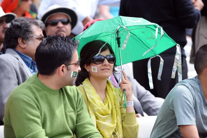 Framed Print : Pakistan Fan Under Umbrella