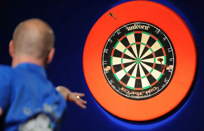 Framed Print : Player Throwing Dart Framed Print : Player Throwing Dart