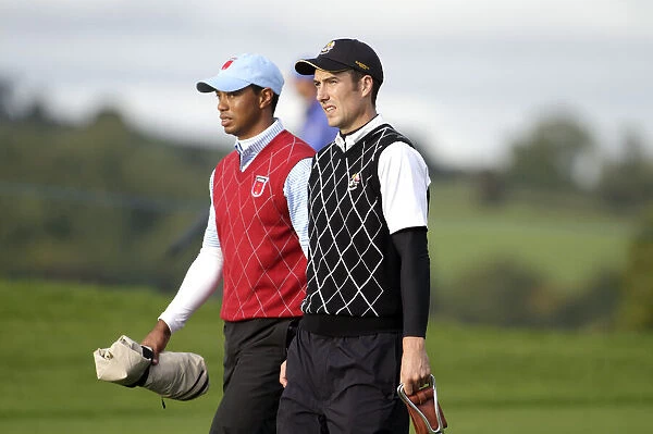 Ross Fisher Walks With Tiger Woods
