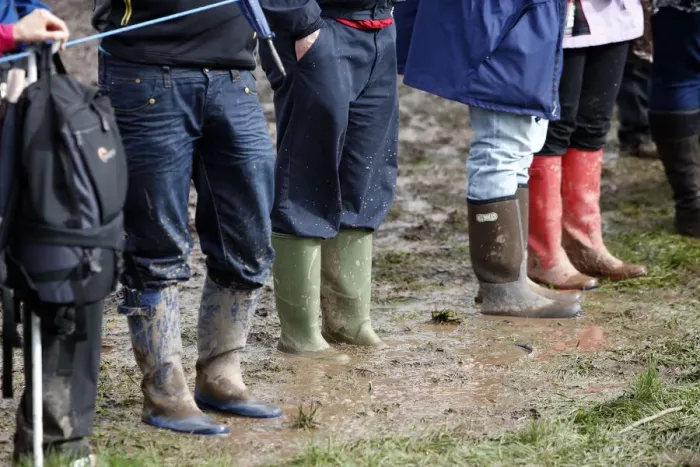 Framed Print : Spectators In The Mud