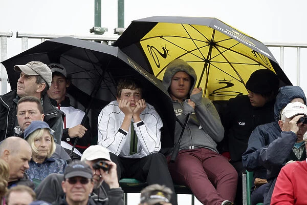 Spectators Shelter In The Stands