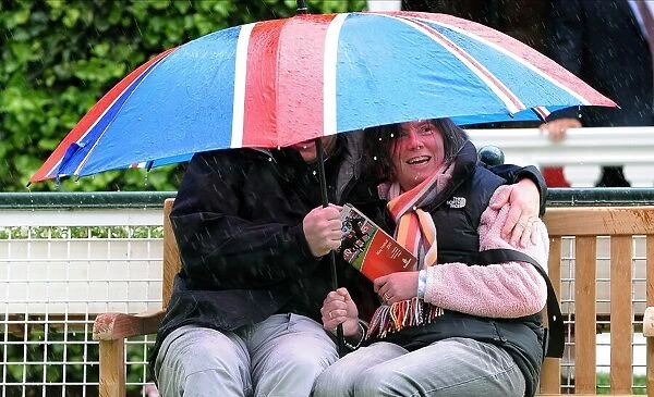 Taking Shelter From Rain Under Union Jack Umbrella