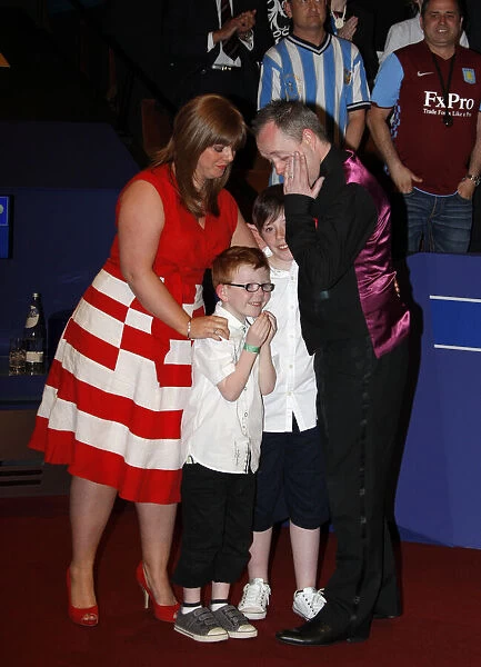 A Tearfull John Higgins With His Wife & Family