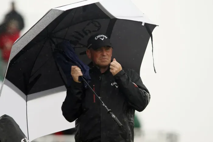 Framed Print : Thomas Bjorn Shelters From The Rain Framed Print : Thomas Bjorn Shelters From The Rain