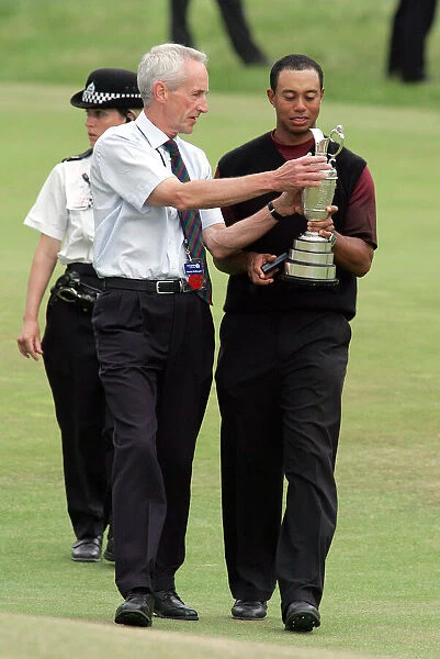 Tiger Woods With Press Officer