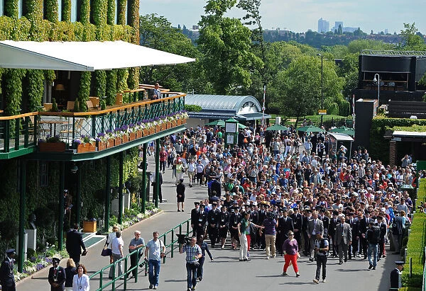 Wimbledon Crowds Led Past Centre Court