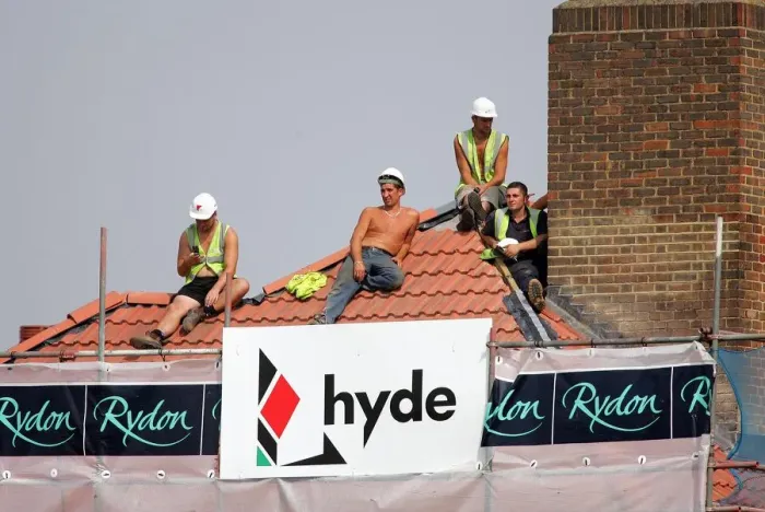 Framed Print : Workers On Roof Top Framed Print : Workers On Roof Top