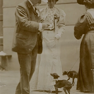 Edwardian people with English toy terriers