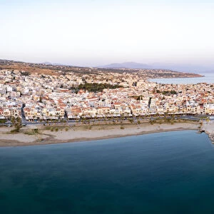 Aerial panoramic view of the old Venetian harbor and medieval town of Rethymno at sunrise, Crete island, Greek Islands, Greece, Europe