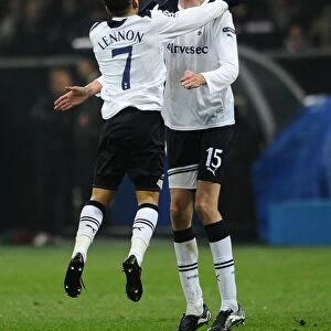 Aaron Lennon congratulates Peter Crouch on his late goal against AC Milan in the 2010 / 11 Champions League