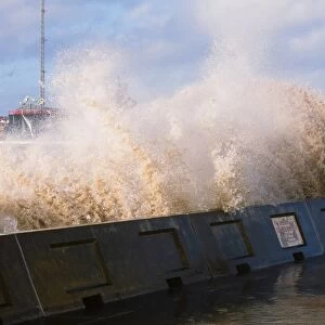 storm waves breaking over the sea wall at Blackpool Lancashire UK
