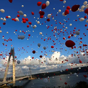 Red and white balloons are released during the opening ceremony of newly built Yavuz