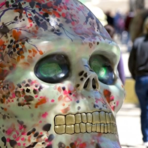 A painted skull is part of a public art display to celebrate the Day of the Dead in Mexico City
