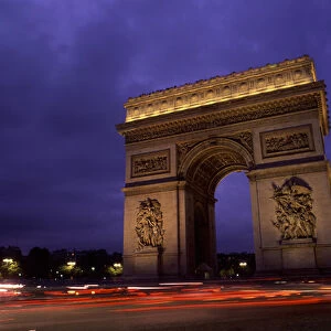 Paris, France. Famous Arc de Triomphe Monument at Sunset