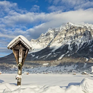 Wetterstein mountain chain with Mt. Zugspitze from Ehrwald with wayside cross, Austria