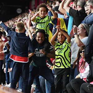 Arsenal Fans Celebrate at AFC Bournemouth: Premier League 2023-24