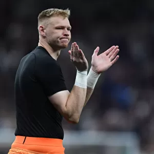 Arsenal's Aaron Ramsdale Celebrates with Fans after Tottenham Clash in 2021-22 Premier League