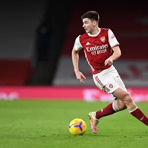 Arsenal's Kieran Tierney in Action: A Battle at Empty Emirates Against Newcastle United (2020-21)