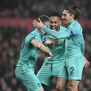Arsenal's Mustafi, Aubameyang, and Bellerin Celebrate Goal Against Manchester United (2018-19)