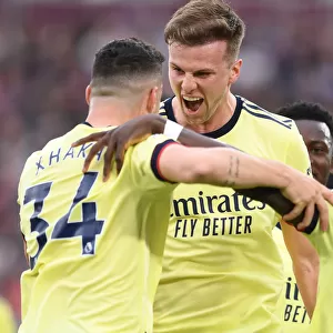 Rising High: Holding and Xhaka Celebrate Arsenal's Goal Against West Ham United (May 2022)