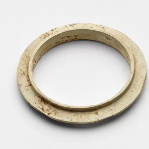 Flanged bracelet, c. 1300-c. 1050 BC (jade, nephrite)
