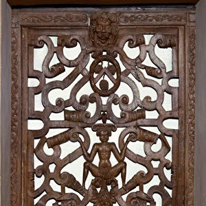 Wooden carved door with skeleton. 16th century Enouen