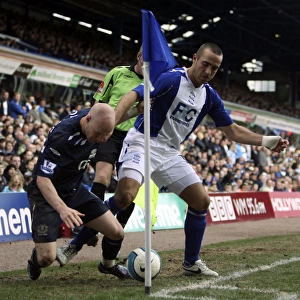 A Fierce Rivalry Unfolds: Andrew Johnson vs. David Murphy in the Birmingham vs. Everton Premier League Clash, 2008