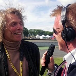 Formula BMW UK Championship: Track commentator Alan Hyde talks with Scott Gorham, guitarist from Thin Lizzy who was a guest of BMW