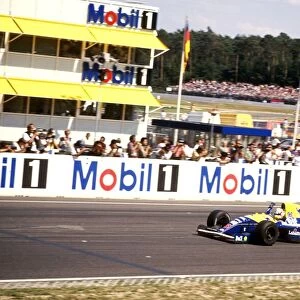 Formula One World Championship 1991: Nigel Mansell Williams FW14 celebrates his race victory at the end of the race