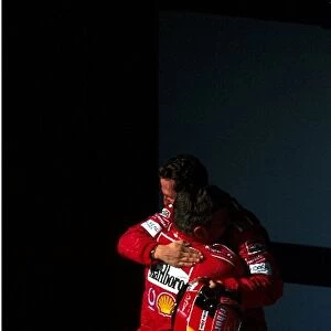 Formula One World Championship: Ferrari Technical Director Ross Brawn congratulates his winning driver Michael Schumacher