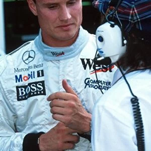 Formula One World Championship: Winner David Coulthard Mclaren MP4-12 with Jackie Stewart