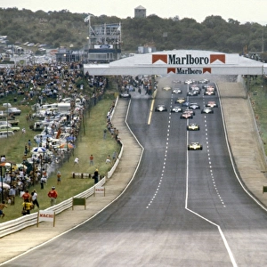 Kyalami, South Africa. 23 January 1982: Rene Arnoux, Renault RE30B, 3rd position, and Alain Prost, Renault RE30B, 1st position, lead at the start