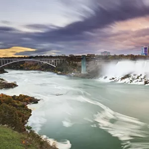 American falls and niagara river at dusk; Niagara falls new york united states of america