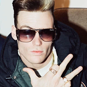 American rapper Vanilla Ice poses during his visit to London. 3rd December 1990