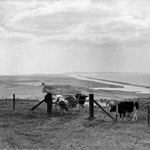 Chesil beach and Portland on the horizon, Dorset. Circa 1940