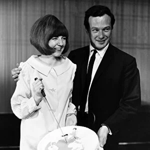 Cilla Black Singer / TV Presenter cutting cake with Brian Epstein in 1964