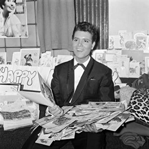 Cliff Richard in the dressing room at the Palladium, with cards for his 20th birthday