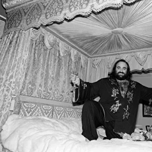 Demis Roussos November 1977 Perched on his mink covered bed which cost 30