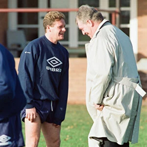 England footballer Paul Gascoigne joking around with coach Lawrie McMenemy at their