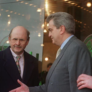 Fergus McCann and Jim Dempsey leader of the Celtic rebel shareholders shaking hands