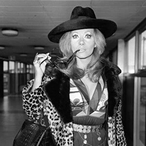 Ingrid Pitt arriving at Heathrow airport from Rome where she has had talks about her new