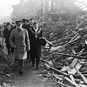 King George VI tours the bomb shattered areas of Birmingham following the city suffering