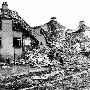Row of bombed damaged houses, Furneaux Road, Beacon Park 1941